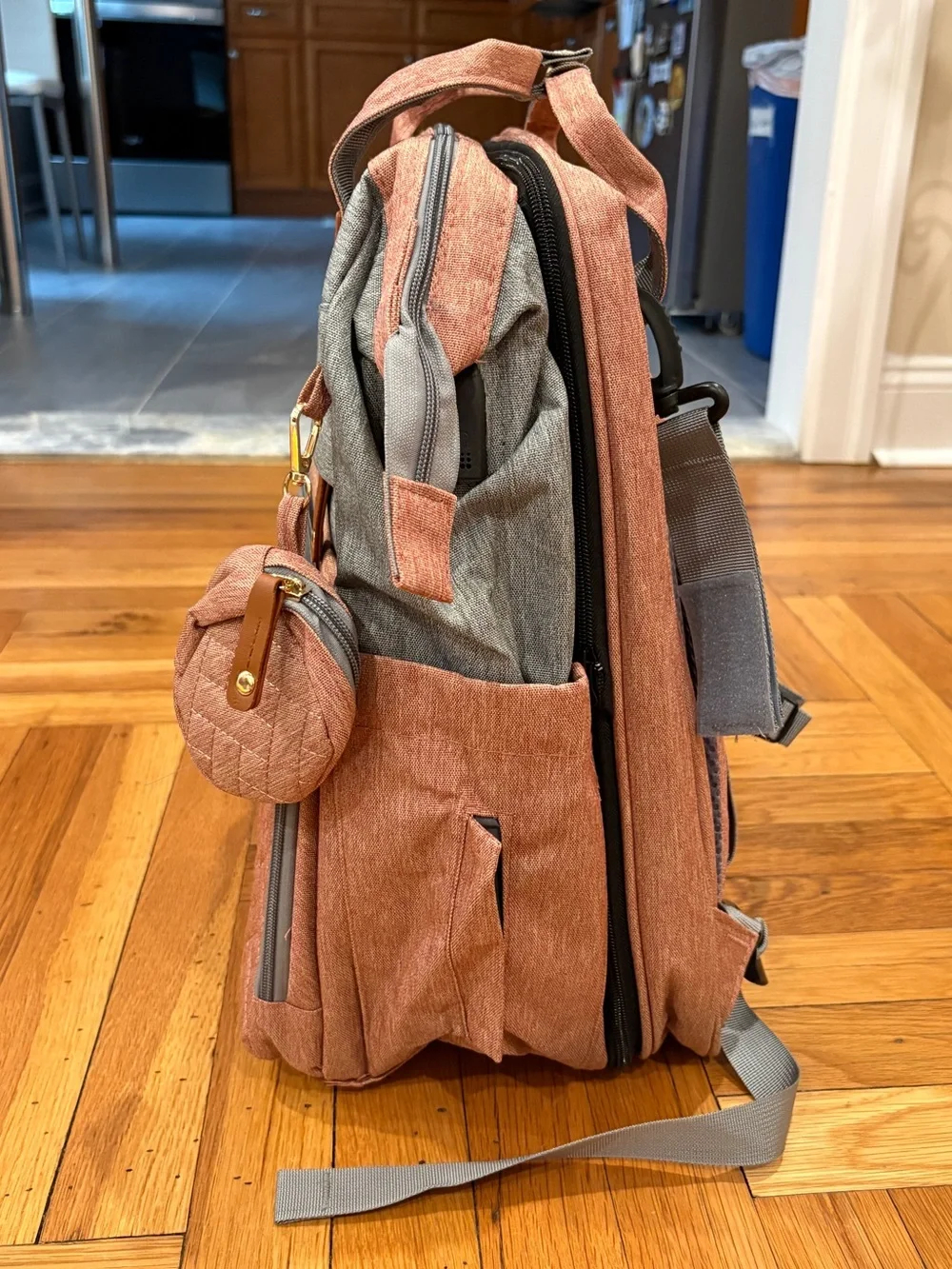 Brand new diaper bag, folds out with a bed